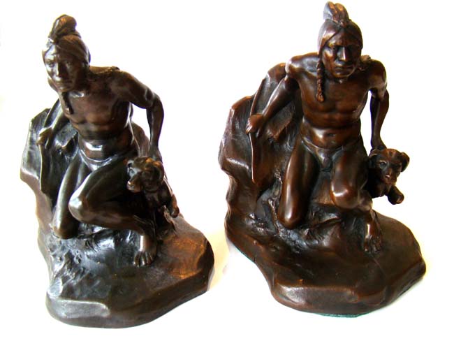 A fine pair of an Indian and his dog bookends by Jennings Brothers of Bridgeport, CT., circa 1930
